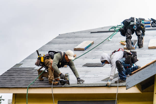 Professional Gutter Installation technician working in Eugene, OR